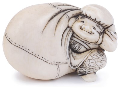 Lot 138 - ~IVORY NETSUKE OF THE LUCKY GOD DAIKOKU EMERGING FROM HIS SACK