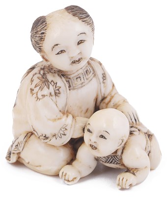 Lot 140 - ~IVORY NETSUKE OF TWO CHILDREN