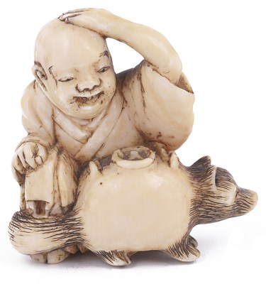 Lot 148 - ~IVORY NETSUKE OF THE BUMBUKU CHAGAMA