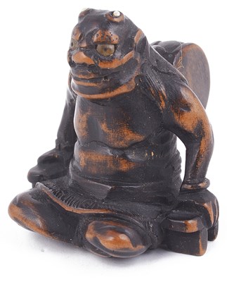 Lot 150 - ~DARK STAINED WOOD NETSUKE OF THE THUNDERGOD RAIDEN