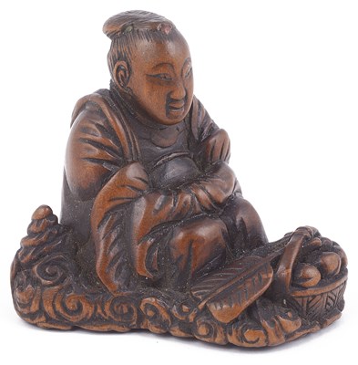 Lot 159 - WOOD NETSUKE OF SEIOBO WITH A BASKET OF IMMORTAL PEACHES