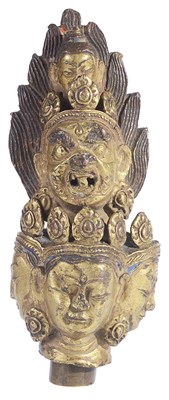 Lot 194 - A FRAGMENT FROM A GILT-BRONZE FIGURE OF AVALOKITESVARA
