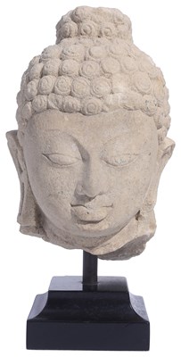 Lot 221 - A BUFF SANDSTONE HEAD OF BUDDHA OR A JINA