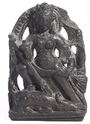 Lot 224 - A SMALL BLACK STONE PLAQUE DEPICTING DURGA MAHISASURAMARDINI