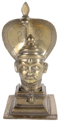 Lot 239 - A BRASS SIVA LINGAM SHRINE