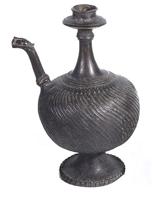 Lot 304 - A BRONZE EWER