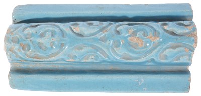 Lot 313 - â€¡A KASHAN TURQUOISE GLAZED MOULDING SECTION