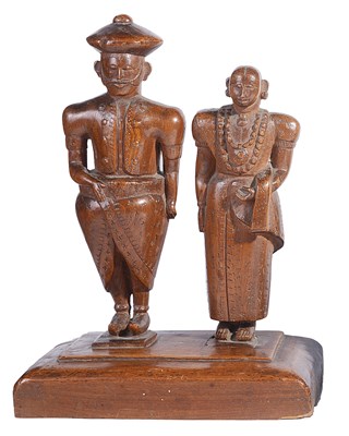 Lot 324 - A CARVED WOOD MODEL OF A KANDYAN ROYAL COUPLE
