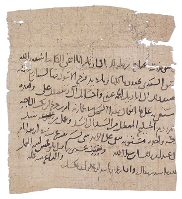 Lot 334 - â€¡AN EARLY ISLAMIC FRAGMENTARY DOCUMENT