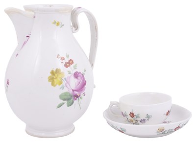 Lot 404 - A NYMPHENBURG TEA CUP AND SAUCER