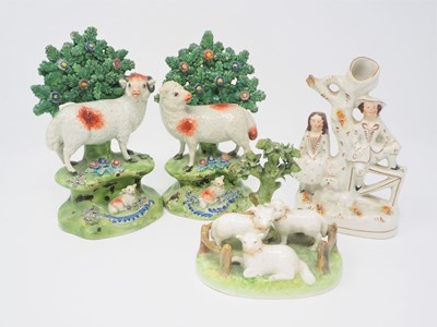 Lot 416 - A PAIR OF WALTON PEARLWARE SHEEP GROUPS