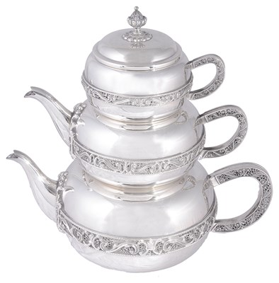 Lot 480 - A SPANISH SILVER THREE-PIECE STACKING TEA SET