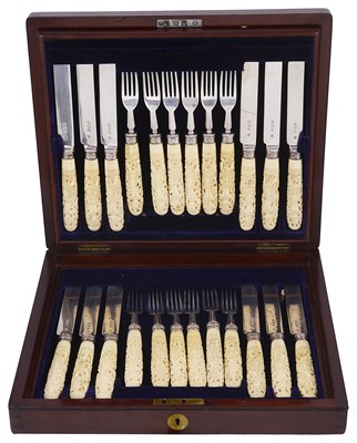 Lot 490 - ~A SET OF TWELVE VICTORIAN SILVER AND IVORY DESSERT KNIVES AND TWELVE FORKS