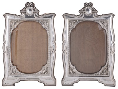 Lot 523 - A MATCHED PAIR OF LARGE SILVER-MOUNTED PHOTOGRAPH FRAMES