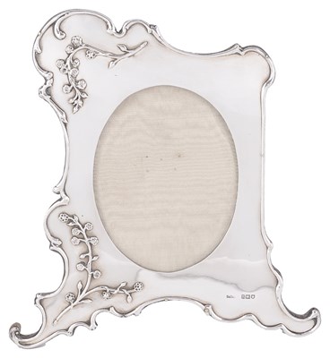 Lot 529 - AN EDWARDIAN SILVER-MOUNTED PHOTOGRAPH FRAME