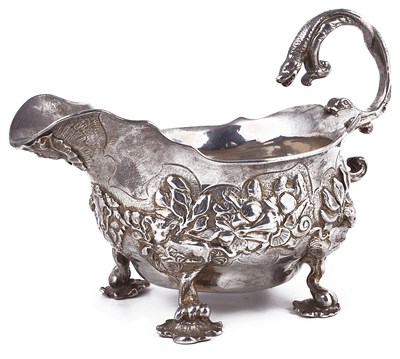 Lot 560 - A GEORGE II SILVER CREAM BOAT