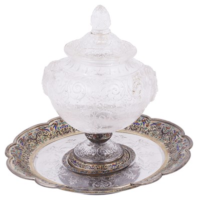 Lot 628 - AN AUSTRO-HUNGARIAN SILVER-GILT-MOUNTED ROCK CRYSTAL CUP AND COVER ON STAND