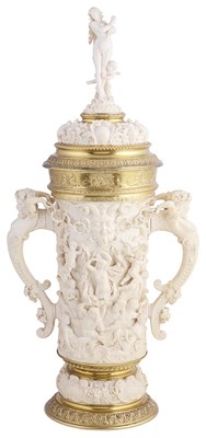 Lot 631 - A LARGE GERMAN SILVER-GILT-MOUNTED IVORY TWO-HANDLED CUP AND COVER