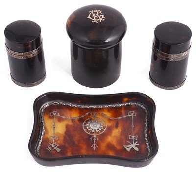 Lot 655 - ~A PAIR OF SILVER-MOUNTED TORTOISESHELL SMELLING SALTS BOTTLES