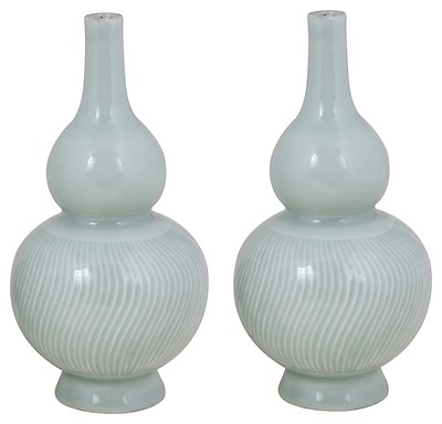 Lot 7 - A PAIR OF CHINESE CELADON GLAZED PORCELAIN VASES