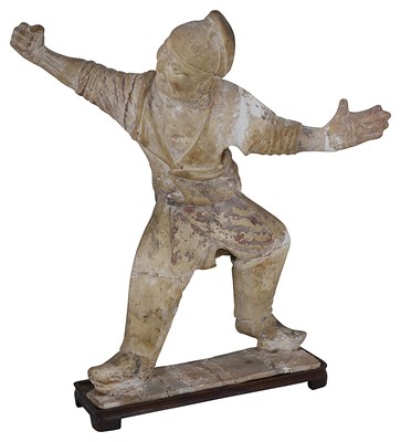 Lot 12 - A CHINESE POTTERY FIGURE OF A HORSE TRAINER