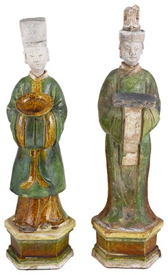 Lot 13 - A PAIR OF CHINESE SANCAI GLAZED POTTERY FIGURES OF ATTENDANTS