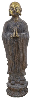 Lot 22 - A CHINESE GILT-LACQUERED BRONZE FIGURE OF ANANDA