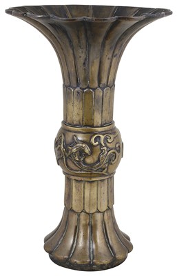 Lot 27 - A CHINESE POLISHED BRONZE 'GU' VASE