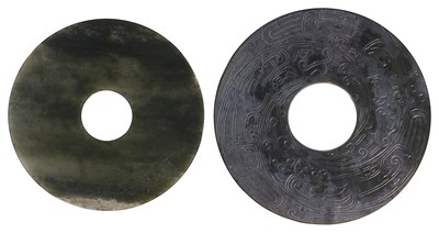 Lot 55 - TWO CHINESE ARCHAISTIC JADE BI DISCS