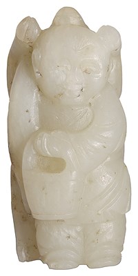 Lot 58 - A CHINESE GREYISH-WHITE JADE CARVING OF A BOY