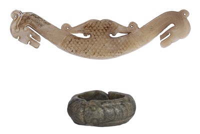 Lot 65 - A CHINESE ARCHAISTIC JADE 'DRAGON' PENDANT