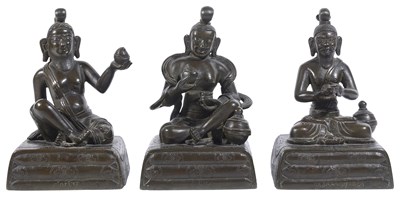 Lot 71 - THREE SINO-TIBETAN BRONZE FIGURES OF MAHASIDDHAS