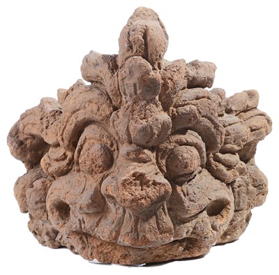 Lot 83 - A JAVANESE TERRACOTTA CORNER ANTEFIX
