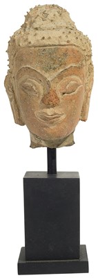 Lot 91 - A TERRACOTTA HEAD OF BUDDHA