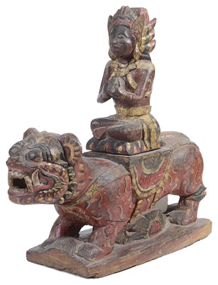 Lot 114 - A CARVED AND PAINTED WOOD FIGURE OF A MYTHICAL LION