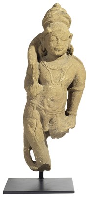 Lot 116 - A BUFF SANDSTONE FIGURE OF AN ATTENDANT