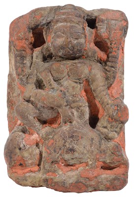 Lot 118 - A SMALL SANDSTONE STELE DEPICTING DURGA MAHISASURAMARDINI