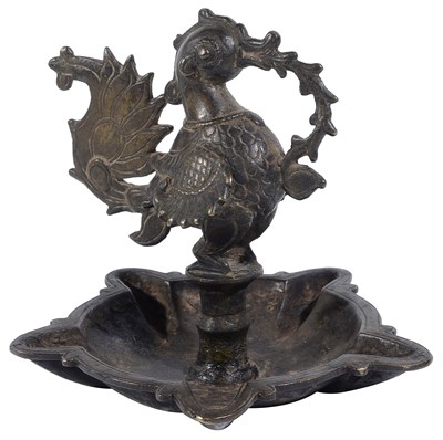 Lot 122 - A BRONZE TEMPLE LAMP