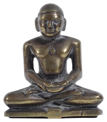 Lot 128 - A SMALL BRONZE FIGURE OF A JAIN TIRTHANKARA