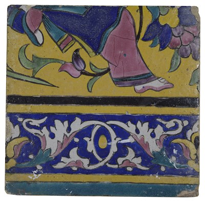 Lot 180 - A QAJAR POLYCHROME-GLAZED CUERDA SECA TILE