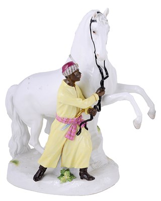 Lot 282 - A MEISSEN GROUP OF A REARING STALLION AND MOORISH GROOM