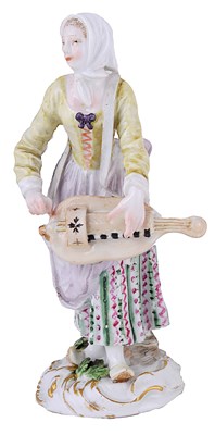 Lot 289 - A THURINGIAN 'CRIS DE PARIS' SERIES PORCELAIN FIGURE OF A HURDY-GURDY PLAYER