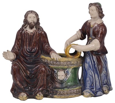 Lot 294 - A FRENCH POTTERY GROUP OF 'CHRIST AND THE SAMARITAN WOMAN AT THE WELL'