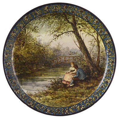 Lot 303 - A DOULTON LAMBETH FAIENCE DISH