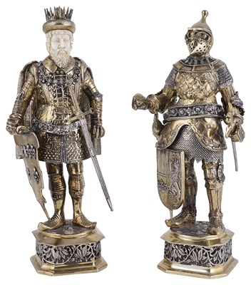 Lot 375 - ËœA PAIR OF GERMAN PARCEL-GILT-SILVER FIGURES OF MONARCHS