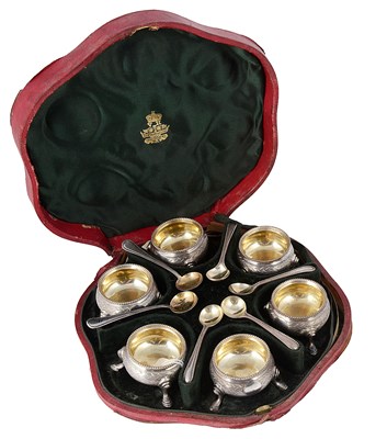Lot 448 - A SET OF SIX VICTORIAN SILVER SALT CELLARS AND FOUR SALT SPOONS