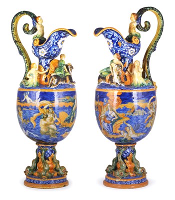Lot 8 - AN IMPRESSIVE PAIR OF ITALIAN MAIOLICA EWERS