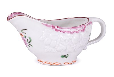 Lot 42 - A SMALL BRISTOL PORCELAIN CREAMBOAT