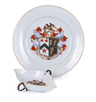 Lot 125 - A CHINESE ARMORIAL PLATE AND DOUBLE LIPPED TWO-HANDLED SAUCEBOAT