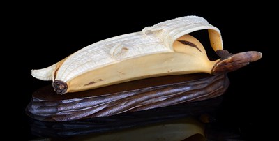 Lot 143 - A JAPANESE IVORY OKIMONO OF A BANANA